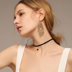 boutique Jewelry - Brand new!!!! Cork/faux leather feather earrings boutique Jewelry - Brand new!!!! Cork/faux leather feather earrings